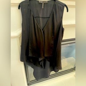BCBG woman’s top. Worn once. Like new. Size medium